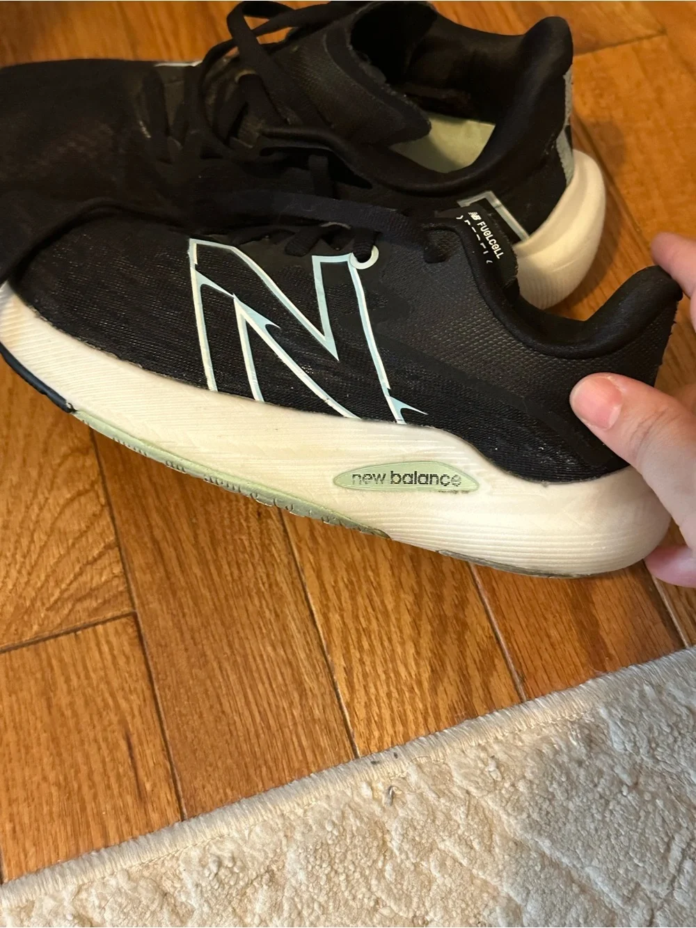 New Balance FuelCell Rebel Black Athletic Sneakers